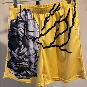 Yellow Graphic Athletic Shorts with Sculpted Face Design